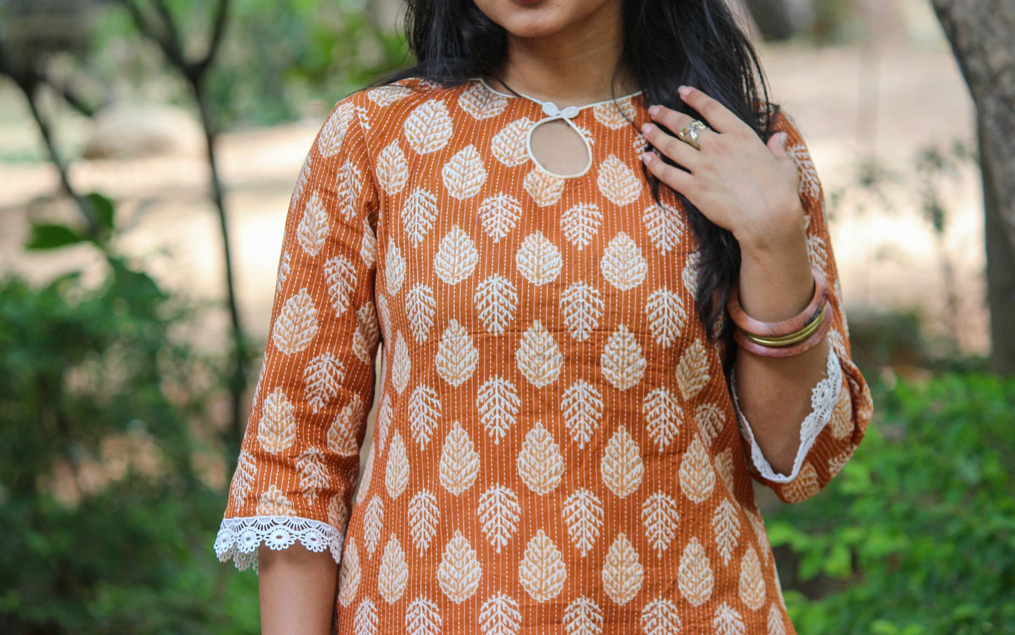 Bimba Studio Tamra breathable cotton straight kurta featuring a botanical handblock print and functional side pocket.