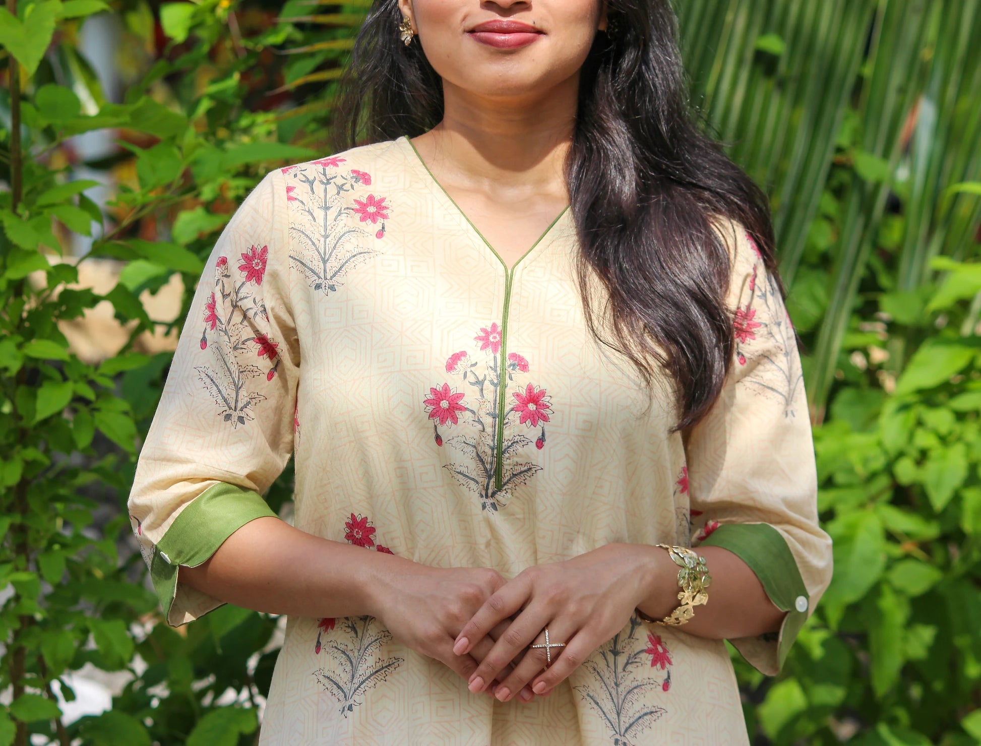 Floral handblock printed cotton co-ord set for women with a V-neck kurta and matching straight-fit pants.