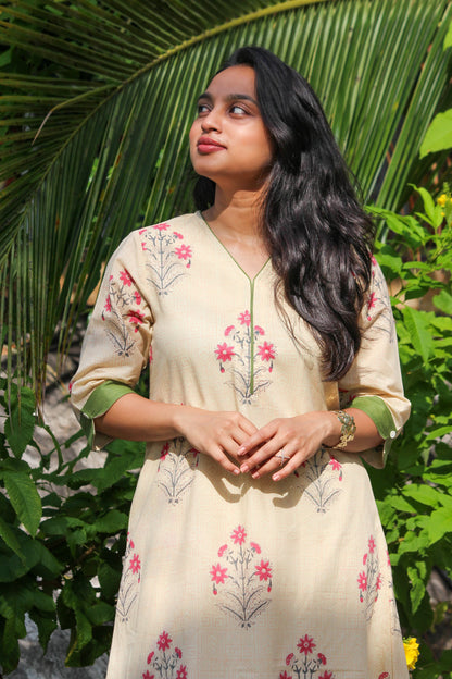 Floral handblock printed cotton co-ord set for women with a V-neck kurta and matching straight-fit pants.