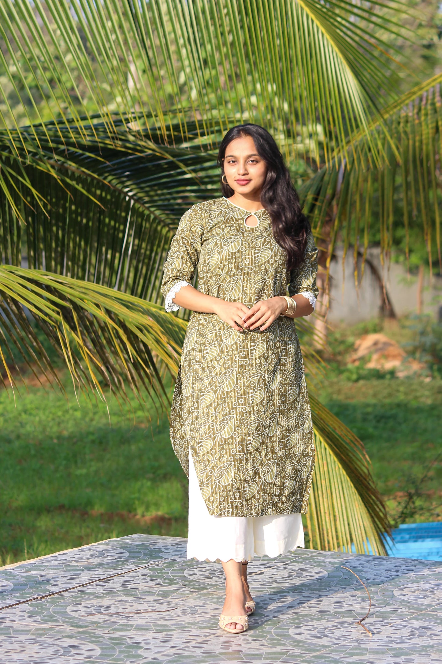 Forest Muse handblock printed cotton straight kurta for women by Bimba Studio featuring a botanical print, round neckline, and 3/4 sleeves.