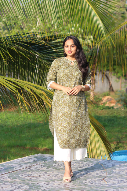 Forest Muse handblock printed cotton straight kurta for women by Bimba Studio featuring a botanical print, round neckline, and 3/4 sleeves.
