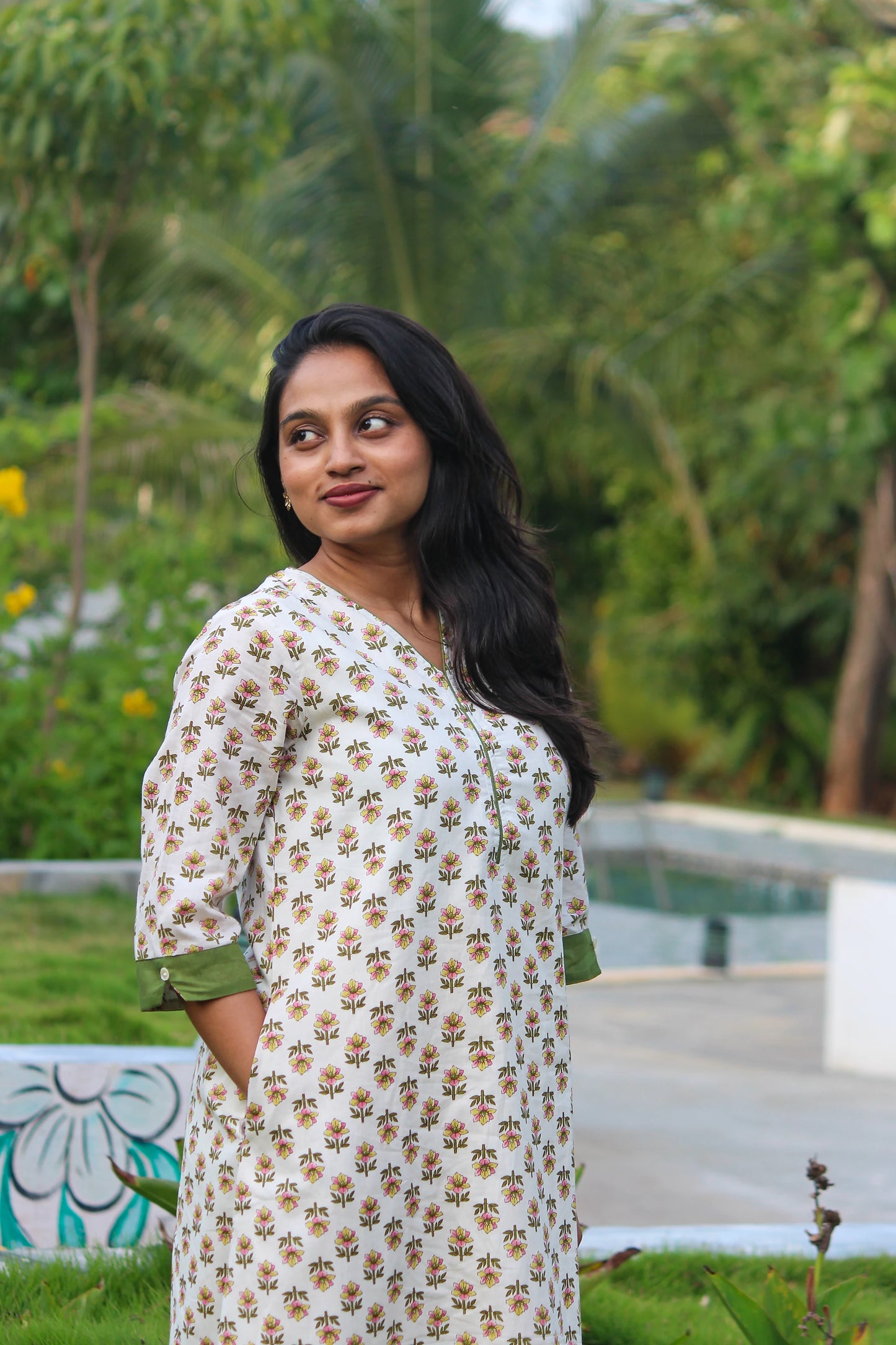 Kusum handblock printed cotton straight kurta for women by Bimba Studio featuring a floral print and 3/4 sleeves.