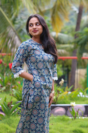 Nakshatra handblock printed cotton co-ord set for women by Bimba Studio featuring a geometric print, V-neck kurta, and matching straight-fit pants.