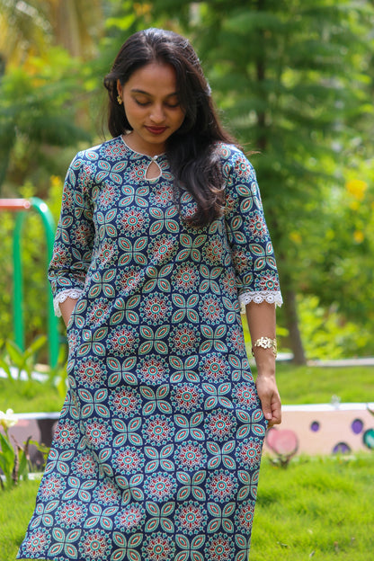 Nakshatra handblock printed cotton co-ord set for women by Bimba Studio featuring a geometric print, V-neck kurta, and matching straight-fit pants.