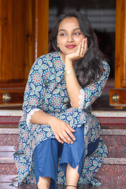 Nakshatra handblock printed cotton co-ord set for women by Bimba Studio featuring a geometric print, V-neck kurta, and matching straight-fit pants.
