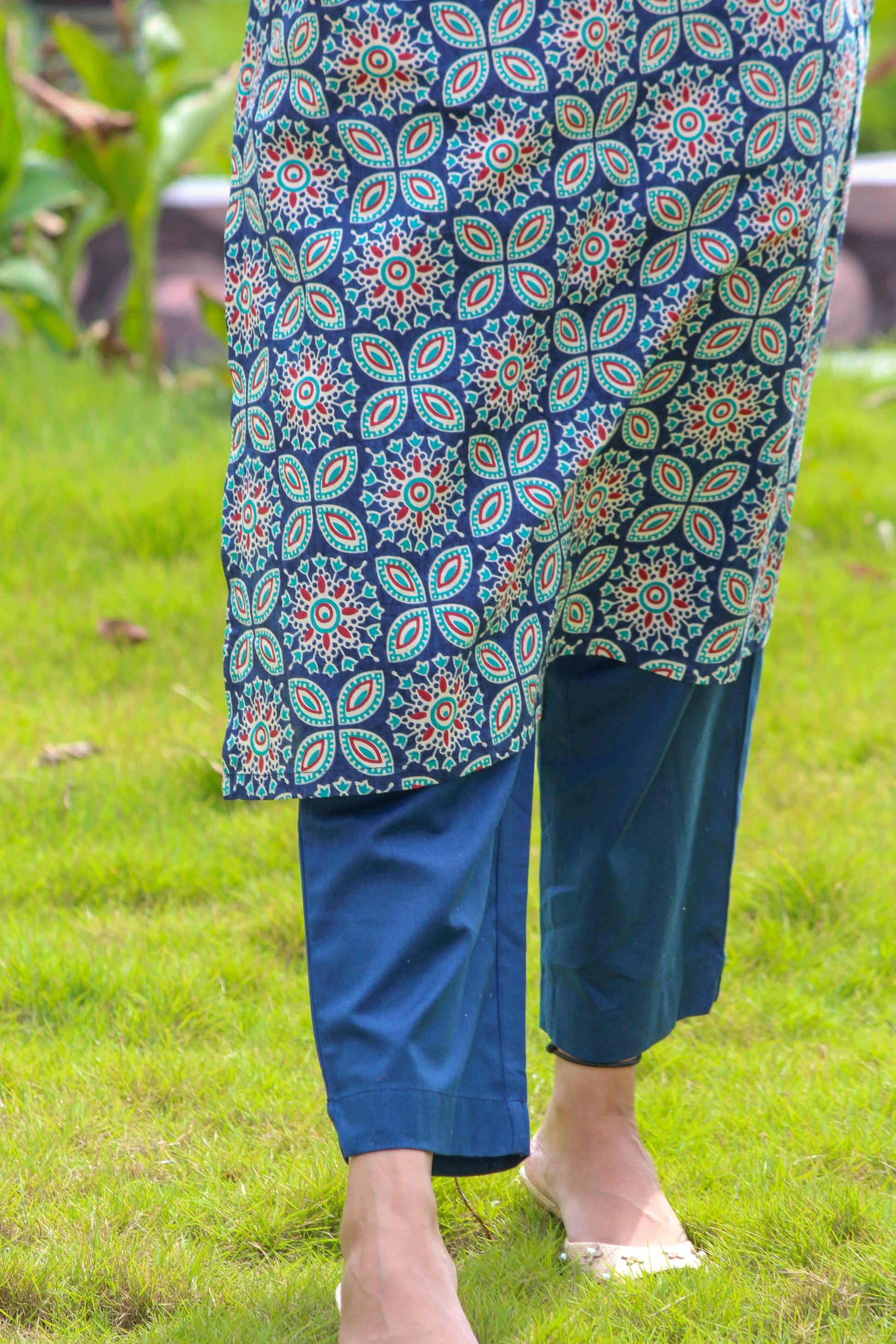 Nakshatra handblock printed cotton co-ord set for women by Bimba Studio featuring a geometric print, V-neck kurta, and matching straight-fit pants.