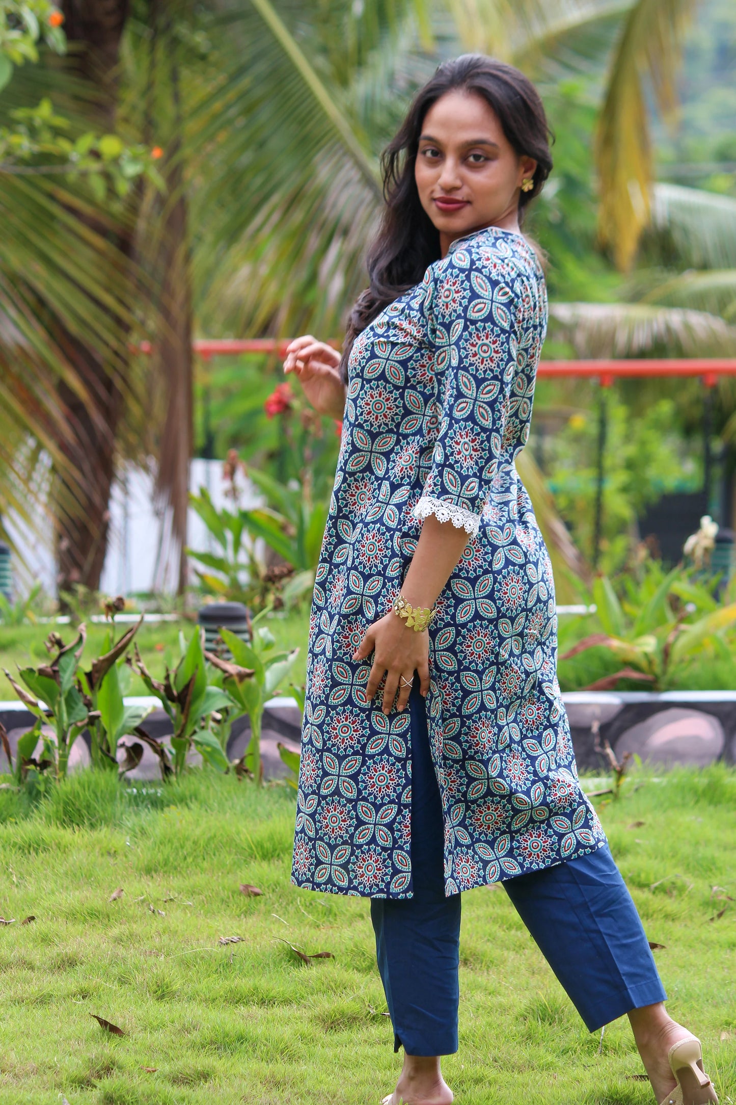 Nakshatra handblock printed cotton co-ord set for women by Bimba Studio featuring a geometric print, V-neck kurta, and matching straight-fit pants.
