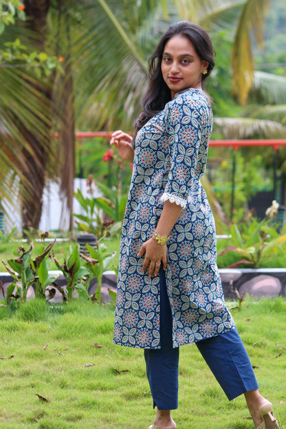 Nakshatra handblock printed cotton co-ord set for women by Bimba Studio featuring a geometric print, V-neck kurta, and matching straight-fit pants.