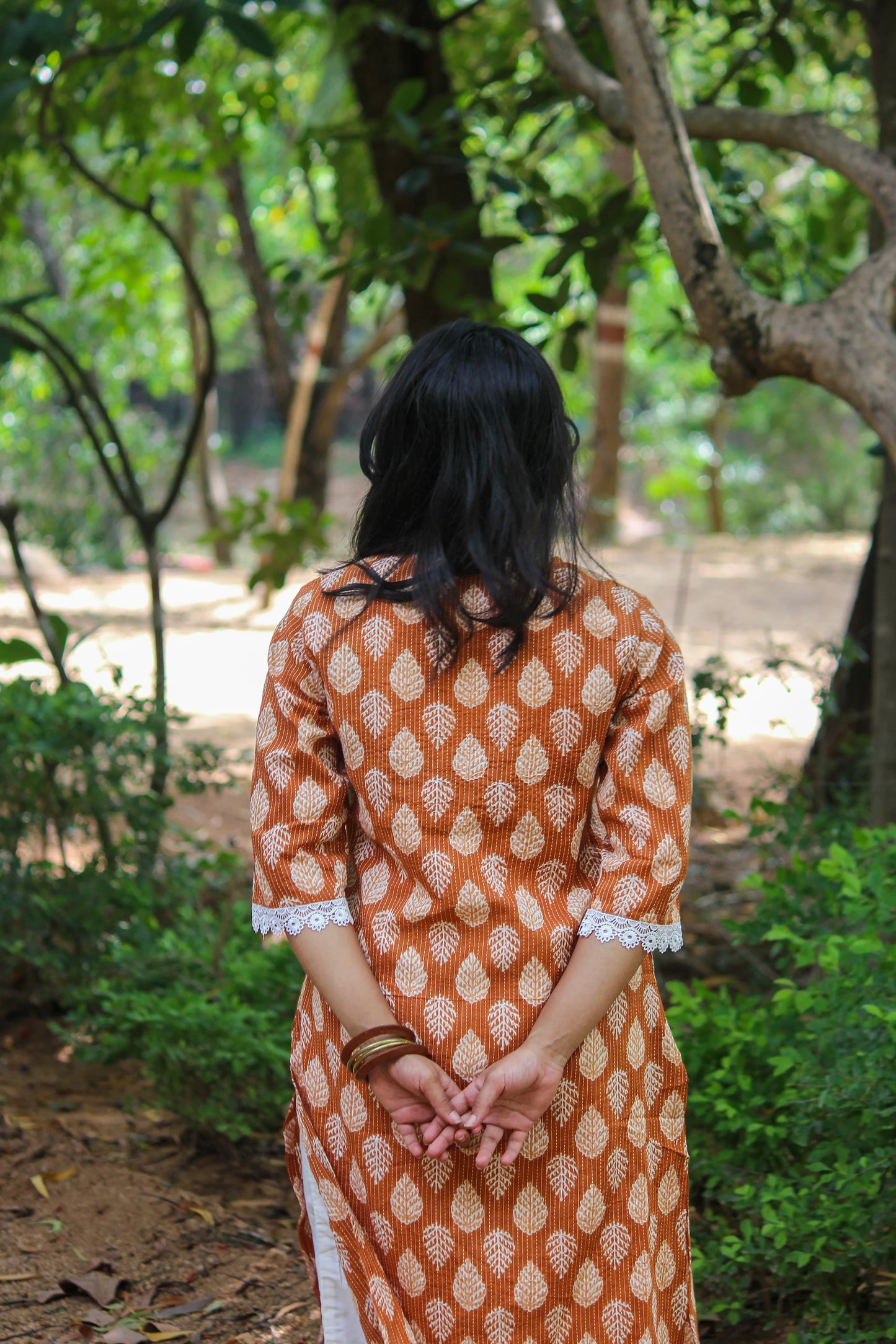Bimba Studio Tamra breathable cotton straight kurta featuring a botanical handblock print and functional side pocket.