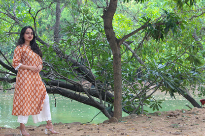Bimba Studio Tamra breathable cotton straight kurta featuring a botanical handblock print and functional side pocket.