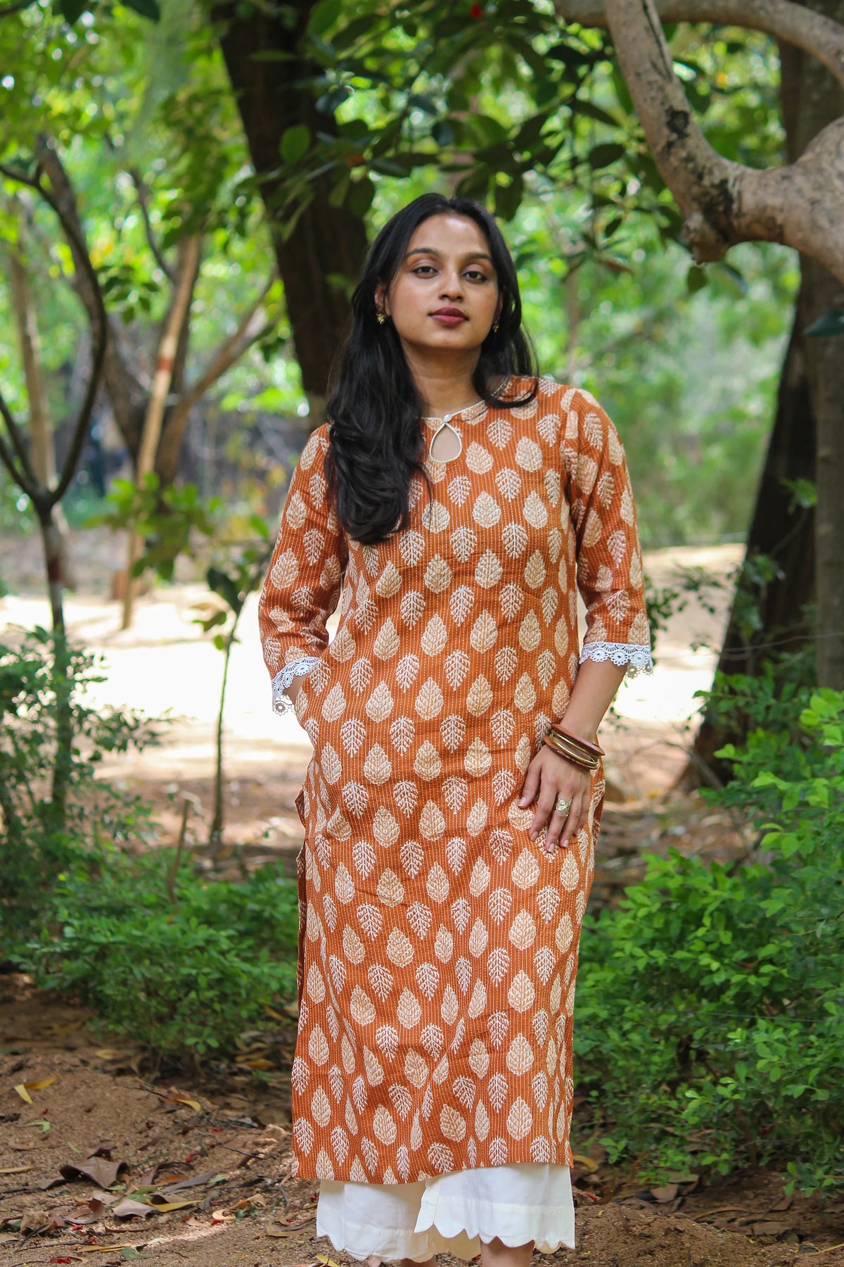 Bimba Studio Tamra breathable cotton straight kurta featuring a botanical handblock print and functional side pocket.