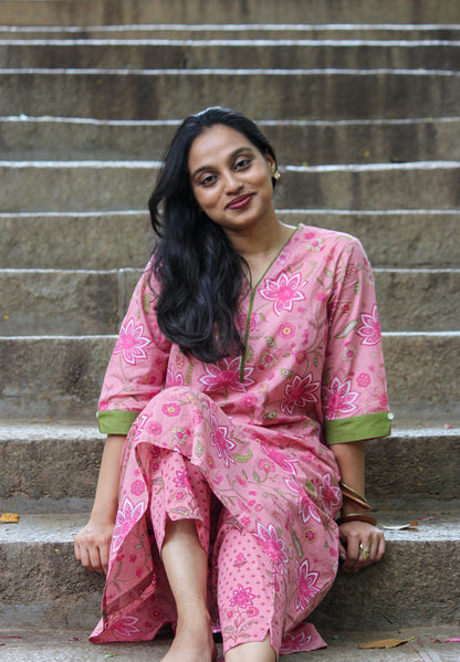 Tavare handblock printed cotton co-ord set for women by Bimba Studio featuring a floral print, V-neck kurta, and matching straight-fit pants