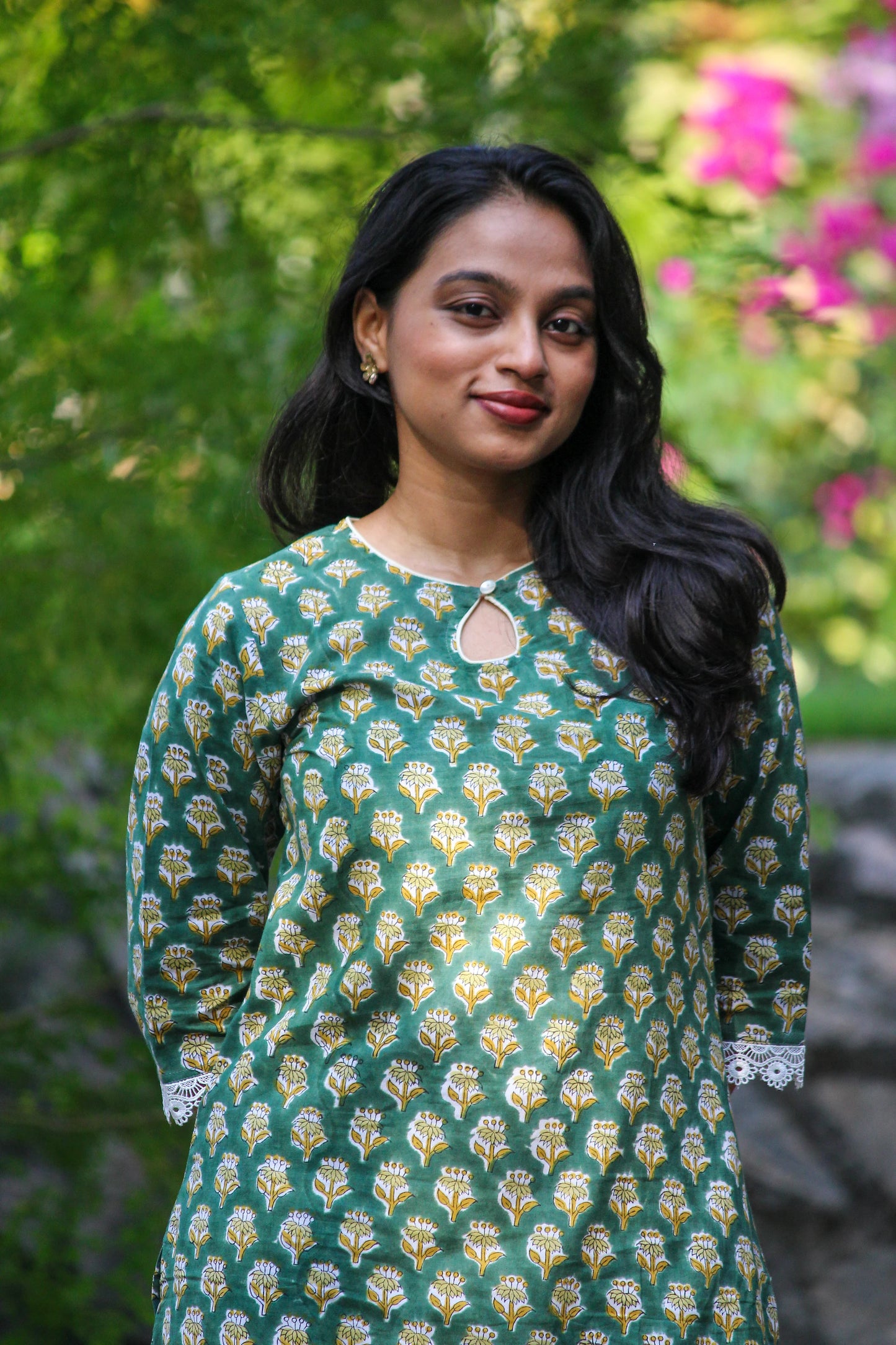 Bimba Studio Veni breathable cotton straight kurta featuring a floral handblock print and functional pocket